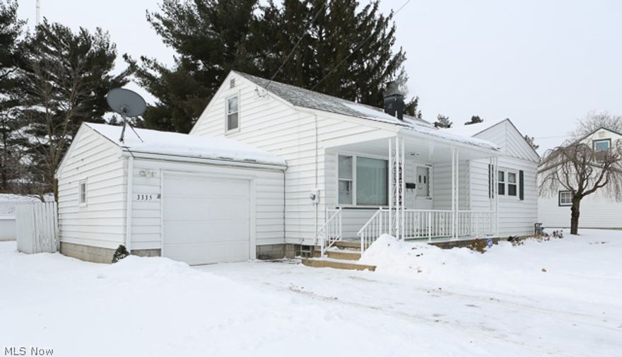 METICULOUSLY MAINTAINED West Side home just off Meridian Rd.  Home features 2 spacious bedrooms on first floor with full bath as well as a sizable upstairs bedroom with half bath.  A comfortable enclosed patio just off the kitchen.  Basement is partially finished with wet bar and sitting room.  Every aspect of this house has been very closely maintained by the owner, replacement windows, newer garage door, glass block windows.  Hot water tank replaced in 2012, Waterproofed basement, updated electrical, roof replaced in 2010.  Hardwood floors under carpet.