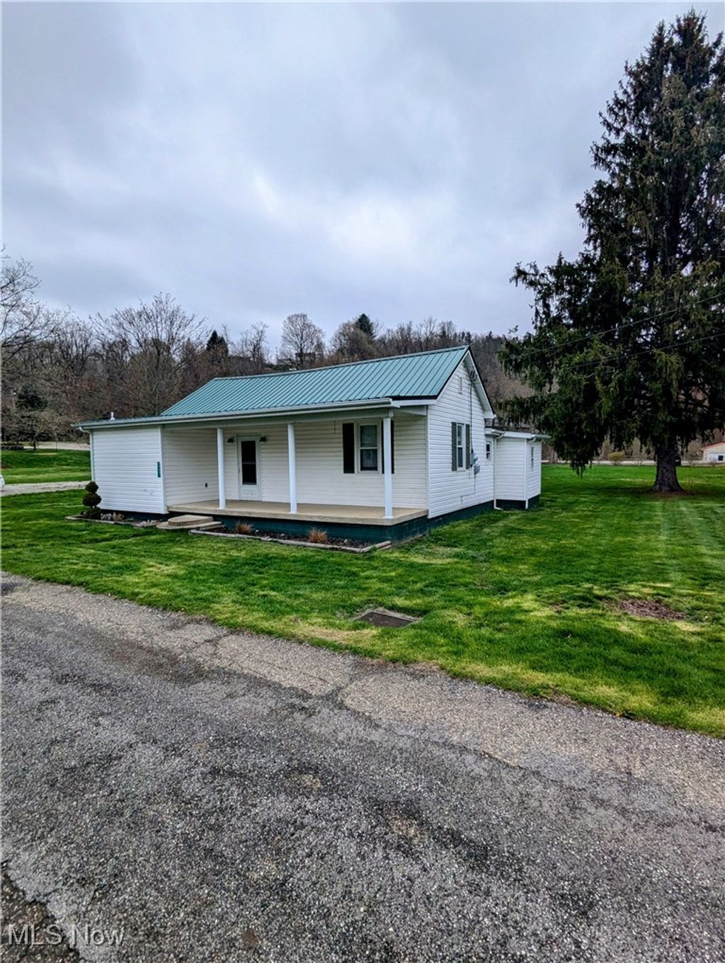 Photo of 49851 Main Street, St Clairsville, OH 43950 (MLS # 5185470)