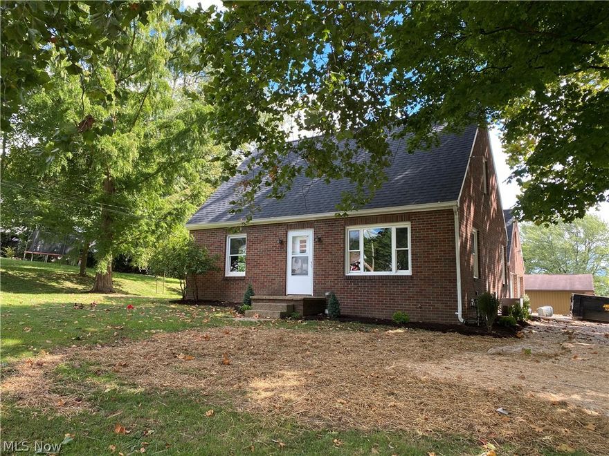 What an opportunity to buy an updated, attractive brick bungalow in a convenient location close to the elementary school in Apple Creek. The main floor has recently undergone a remodel and features a super cute kitchen with white cabinets, tile backsplash, brand-new stainless appliances, and a breakfast nook with lots of natural light. Additionally, the main floor hosts a living room, 2 bedrooms and a beautiful bathroom complete with overhead rain showerhead. Upstairs you will find an additional 2 bedrooms. The full basement adds additional storage space, utilities, and laundry. Newer vinyl windows throughout the home and the roof is approximately 4 years old. The detached, brick 2-car garage gives plenty of space for your vehicles along with a workshop area. The attic is easily accessible via stairway and gives additional storage space. Utilites to the home are NG forced air heat and central AC, electric hot water heat, public water & sewer, and water softener.