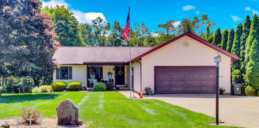 Welcome to this charming ranch-style home nestled on a quiet dead-end street at beautiful Lake Mohawk. This thoughtfully designed residence features an open floor plan that seamlessly connects the living, dining, and kitchen areas—perfect for entertaining or everyday living. Enjoy year-round tranquility in the spacious four-seasons sunroom, offering stunning views and abundant natural light. The main level includes a comfortable bedroom suite, providing a private retreat. Downstairs, the walkout lower level serves as a fully equipped additional living suite complete with its own bedroom, full bath, kitchen, and living room—ideal for guests, in-laws, or rental potential. Experience lake community living with the convenience of a functional layout and flexible living spaces.