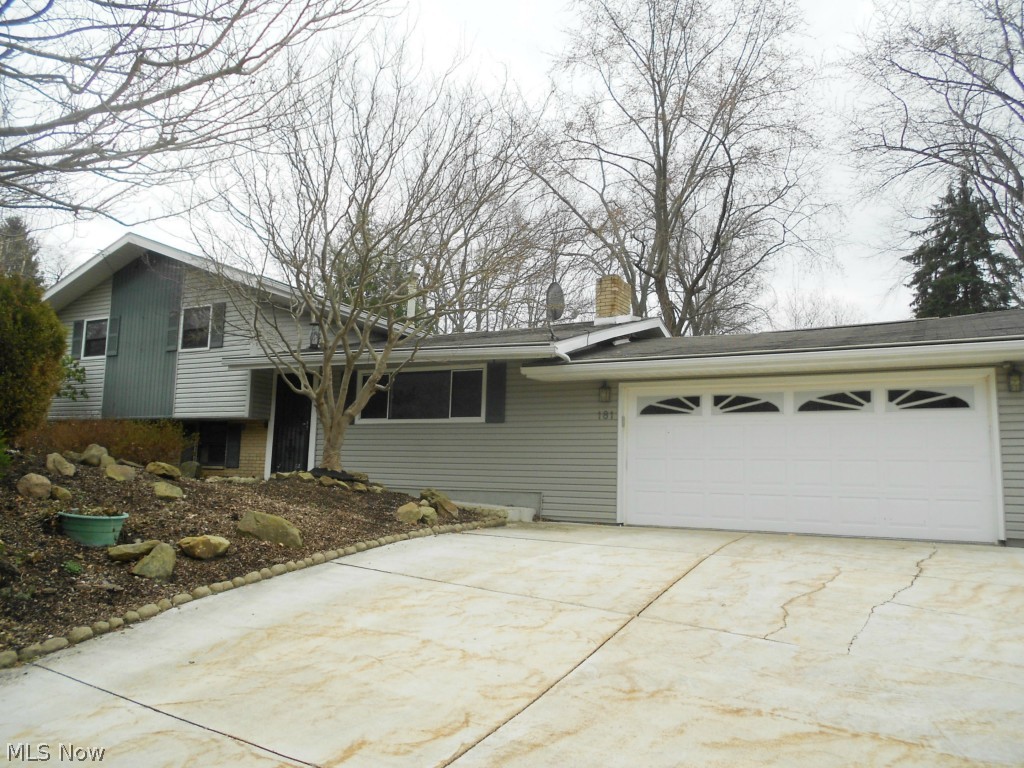 Move in condition! This spacious 3 bedroom, 2 full bath home has been freshly painted and has new carpeting (3/2015) throughout most rooms. The fully applianced oak kitchen offers lots of cabinet and counter space, a desk area and 2 pass throughs…1 to the dining room and 1 to the all season sun room. A vaulted great room features built-ins and a gas fireplace; a second gas fireplace can be found in the sun room. All bedrooms have nice closet space and there is new flooring on the upper level full bath. Sliders and lower level walk-out lead to the private patio and beautifully landscaped backyard which features a pergola and nice shed. The stamped concrete patio offers plenty of room for 4+ tables – perfect for grilling and entertaining this summer. This property offers an extra large two car garage, a home warranty and updates that include: garbage disposal and electric panel (2/2015), plus Helmet Guard gutters.