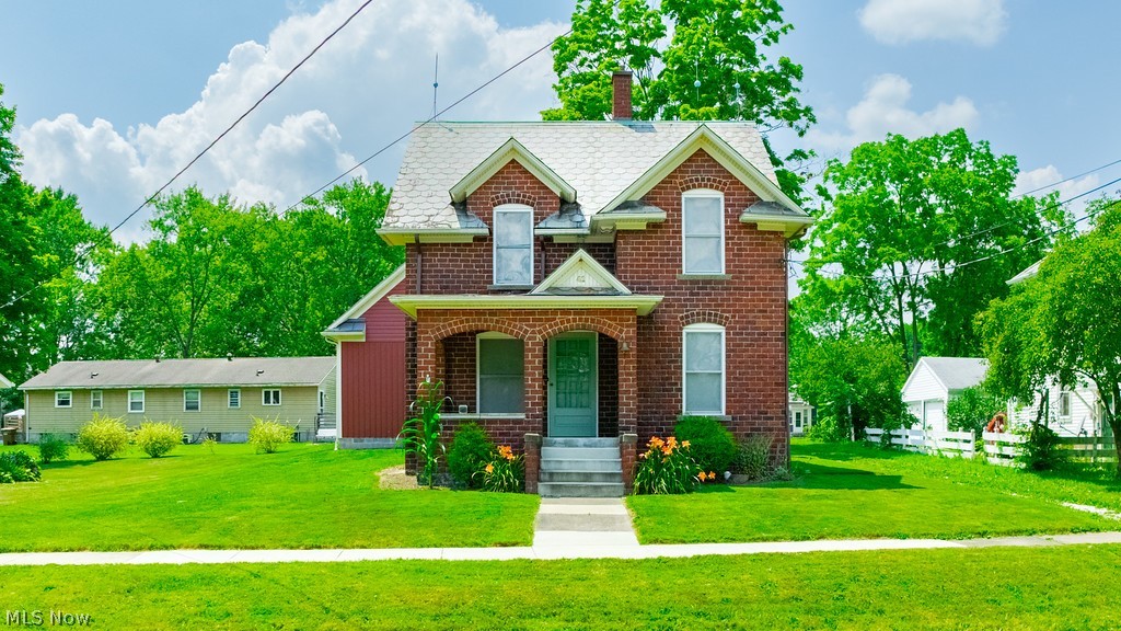 Don't miss this remarkable opportunity for a completely renovated century home! The house received a complete overhaul in 2008 including electrical, plumbing, insulation, new windows, heating and a/c, the 2 car garage and side porch were added in 2020 the garage offers a second floor that can be used for storage or entertainment area. The family room has hardwood floors and is open to the kitchen. The second floor offers three bedrooms and full bath with washer and dryer, the third floor/attic could be used for a 4th bedroom.
This adorable home is awaiting the new proud owners. Call and schedule your private showing today.