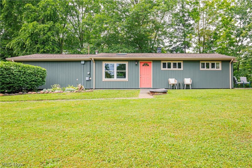 Welcome home to this updated, well maintained ranch house on the Cuyahoga River. The home resides on almost 2 acres of land with established woodlands and a portion of the Cuyahoga River for your enjoyment. You'll find great features including raised ceilings, recessed and updated lighting, multiple skylights, and stylish wood LVP flooring. The large family room includes a wall of closets for storage and is a step down from the main floor with a sliding door to take you to one of the patios. This open kitchen and dining area layout provides plenty of natural light, a center island, custom cabinets surrounding the refrigerator, and a coffee bar; making every meal special. The previous owner expanded the master bedroom by removing a shared closet wall with another bedroom and also created a built-in makeup vanity (the home can be returned to its original 3 bedroom design by reinstalling the shared closet wall). Master bedroom has access to the side patio through a sliding door. The updated LVP flooring was installed in 2018 and 2019 and 2021, a new water softener in 2019, dishwasher in 2018, washer/dryer in 2021, remodeled family room in 2022 with new insulation, new septic system in 2018, a newer well pump and new roof in 2022. The oversized outbuilding has a concrete floor, updated electric and wood stove for year round use. It's a one-of-a-kind property that you need to call your own!  Don't hesitate, schedule your showing before this opportunity is gone!