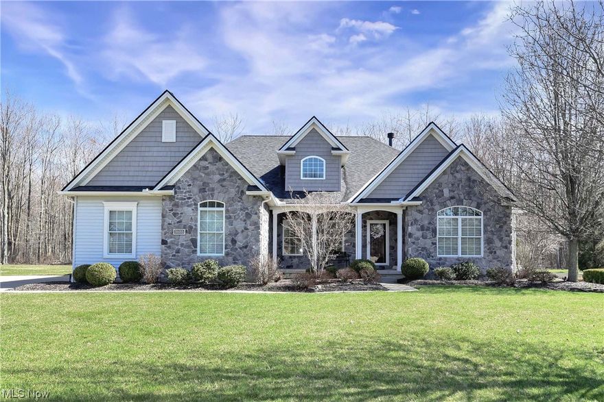 Prepare to be moved! Welcome to your new dream home at 3125 Stone Wheel St. in the highly sought-after neighborhood of Stone Wheel Run. This immaculate ranch-style home boasts a spacious & open-concept layout with 3 bedrooms, 2 full and 2 half bathrooms, including a primary suite on the main floor. With attention to every detail, this home has been custom built to the sellers' plan & ideas, making it truly one of a kind. The heart of the home is the open concept family room with a stunning stone brick fireplace, perfect for cozy nights in. The large office provides a quiet space to work from home or can be used as a 4th bedroom. The designated dining room adds a touch of elegance for special occasions. The chef's kitchen is a true highlight, featuring an abundance of cabinet & counter space, a center island, coffee bar, & a casual dining area. French doors lead from the sunny & cheery sunroom to the pergola-covered patio, overlooking the inground pool & expansive fully fenced backyard, creating a perfect oasis for relaxation & entertaining. The private primary suite boasts vaulted ceiling, his and hers closets, and an en-suite bathroom. The other 2 bedrooms are spacious making them perfect for your family or guests. A half bath and laundry room complete the main floor. Downstairs, the partially finished basement offers a spacious rec room, half bath, & additional storage space. The attached 2-car garage provides convenience & extra storage space. The home is situated on a spacious 0.41-acre lot, backing up to a wooded area offering plenty of outdoor space for kids and pets to play. Located in the desirable Avon community, in close proximity to the Westlake border, this home offers the best of both worlds. Enjoy the peacefulness of a quiet neighborhood while still being close to Avon Commons and Crocker Park for shopping, restaurants, & more. You'll be immediately drawn to this lovely, warm, & inviting home. Call today to schedule a private tour. *Virtual Tour*