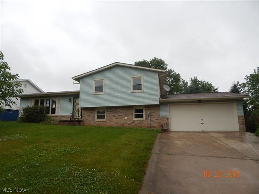 Traditional split-level located in Perry Hills Allotment with brick & vinyl siding, living and family rooms, kitchen opens to dining area, 3 bedrooms up, 1.5 baths, attached 2-car garage and central air.  Equal Housing Opportunity.  Sells As Is.  Contingent upon Seller signed documents.