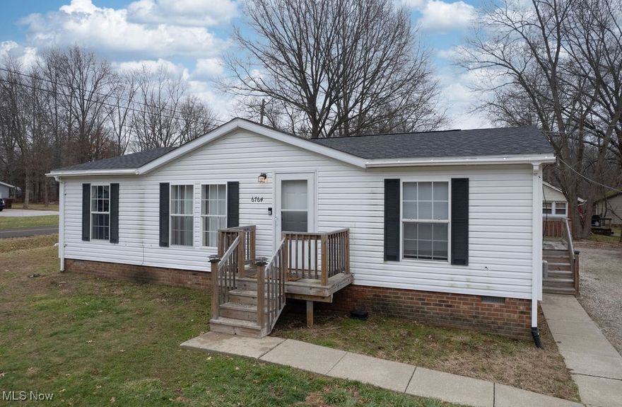 Step into this move-in ready home offering the comfort and convenience of true single-floor living. The front door opens into a bright, welcoming living area that flows effortlessly into the spacious eat-in kitchen. Updated wood-style flooring runs throughout the main spaces, providing durability and easy maintenance.
The generous kitchen includes all appliances and features abundant counter and cabinet space, making meal prep a breeze. Just off the kitchen, the laundry area provides quick access to the back door for added practicality.
The large primary suite creates a peaceful retreat with its expansive layout and a luxurious bathroom complete with a soaking tub/shower combination. Two additional bedrooms sit on the opposite side of the home—an ideal setup for children, guests, or a home office. A second full bathroom is conveniently located off the living room, perfect for everyday use and entertaining.
Outside, the backyard features a sizable two-car garage—an excellent fit for hobbyists, car lovers, or extra storage. The front of the home also offers the potential for easy ramp installation if accessibility is desired.