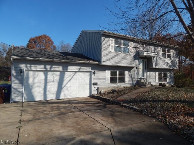 Nice 4 bedroom, 2 baths, bilevel, spacious rooms, family room with sliding glass door leading to an outside patio, fresh paint, new carpet throughout, inground pool, 2 car attached garage and 2 car detached garage. Great home call today.