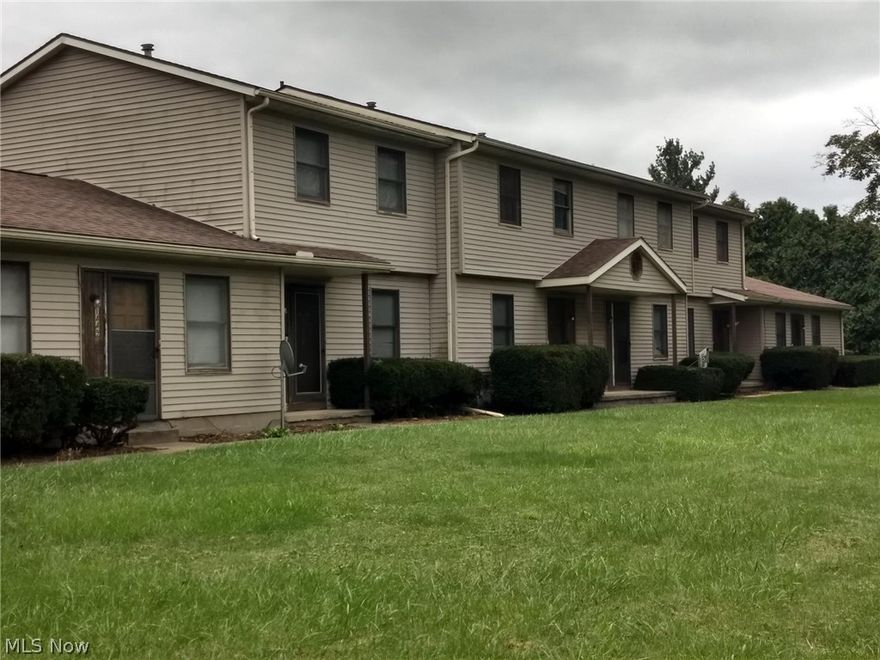 Six-unit apartment building with four townhomes and two ranch-style units. These are two-bedroom and three-bedroom units with central air, plus a separate 2-car garage. This opportunity is limited to qualified buyers who have submitted an acceptable, non-binding letter-of-intent. Please do not disturb the tenants. Listing agent has a small equity interest.