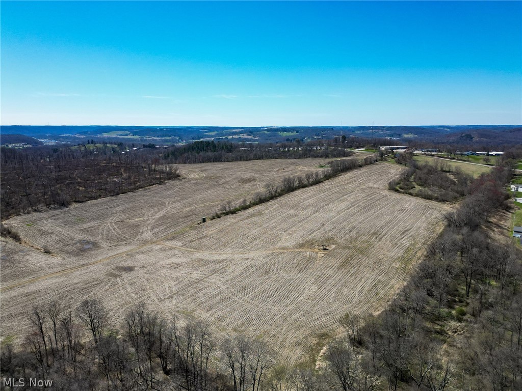 Auction May 18th at 12PM (Parcel 15: 42.701 Acres)
Parcel 15: 42.701 acres of open and wooded land, approx. 50’ frontage on TR 336
An excellent tract of 351 contiguous acres to be offered in 22 parcels. What a great selection of building sites coupled with wooded/recreational hunting land. It has an excellent frontage on TR 336 and some frontage on SR 241for good access to each parcel. Improvements include 2 older but very livable homes, and an older bank barn with hand hewn beams that are still in excellent condition. Both homes have been maintained and had updates throughout the years. There are 7provideslls on the farm which provides free gas to both homes as per oil and gas lease.