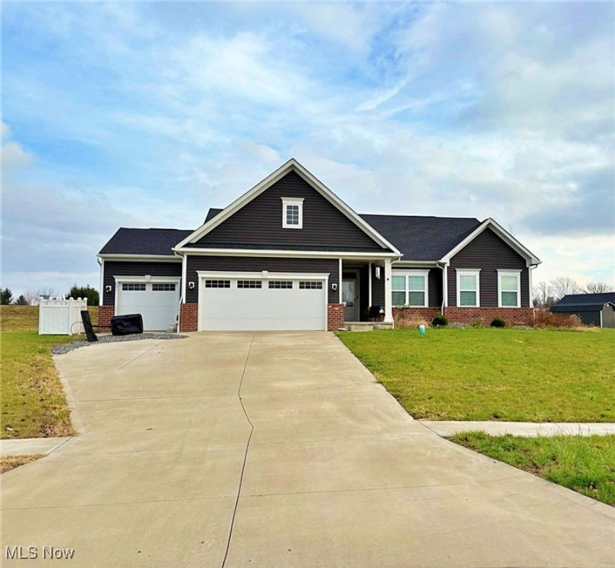 Built in 2021, this modern ranch features three bedrooms, three full bathrooms, and a full, partially finished basement for added living space. The home includes many upgrades throughout, offering a fresh and polished feel from top to bottom. The spacious master suite provides a private bath and direct access to an 8×18 fenced-in back deck. Just beyond the deck is a wide concrete patio that’s ideal for relaxing or hosting gatherings, all overlooking a deep, generously sized backyard that provides plenty of space to enjoy.  With a three-car garage and an exceptional lot, this home delivers comfort, quality, and room to grow.
