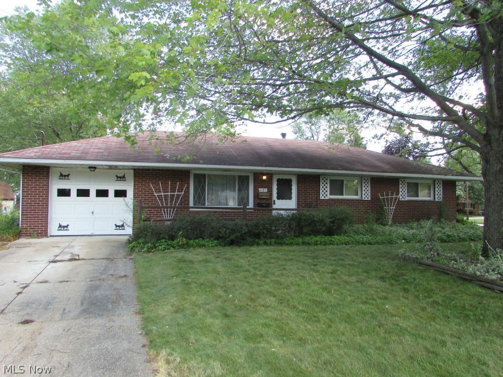 An excellent opportunity to be in Stow for $80,000. Bring your own touches to this 3 bedroom, 2 full bath all brick ranch. There is an attached 1 car garage.