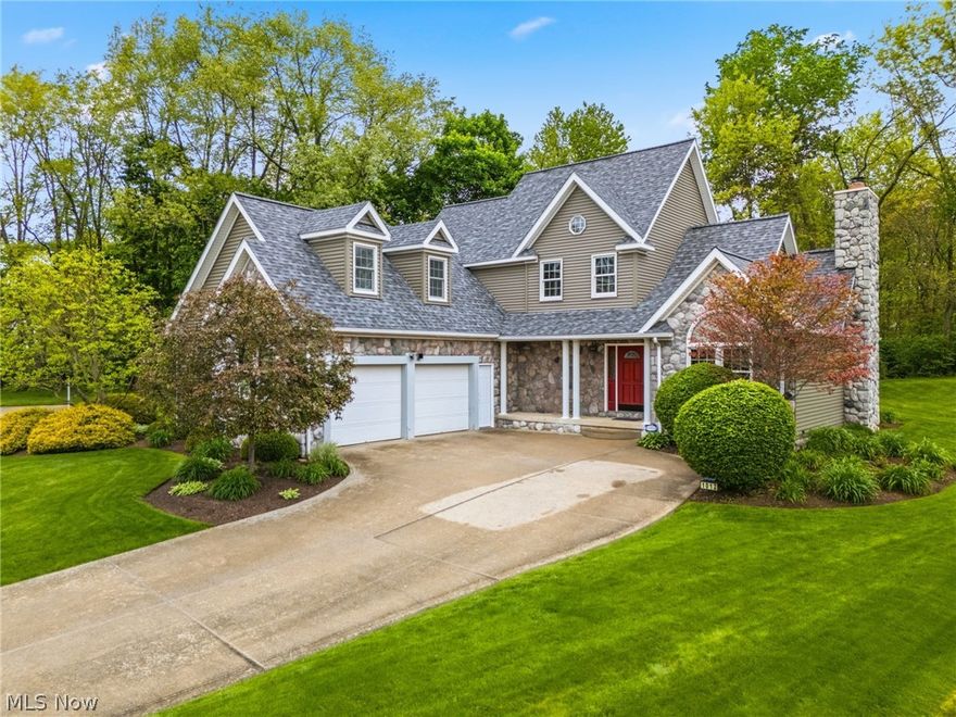 Former parade home by builder Matt Wickersham, this exceptional Colonial Hills residence combines timeless design, generous living space, and a private wooded setting at the end of a quiet cul-de-sac. Offering 3 bedrooms with the potential for a 4th bedroom in the finished lower level, 3 full baths and 1 half bath, the home features 2,791 square feet plus nearly 1,000 additional finished square feet in the lower level. The two-story foyer opens to a vaulted great room with fireplace and an office with French doors and cathedral ceiling. The kitchen includes a breakfast bar, walk-in pantry, and bayed dining area overlooking the 12' x 23' patio and wooded backdrop. The first-floor owner's suite offers patio access along with a spacious bath featuring dual vanities, jetted tub, tiled shower, and a walk-in closet conveniently connected to the laundry room. Upstairs, two large bedrooms each include walk-in closets and share a Jack-and-Jill bath, while the expansive bonus room with window seats provides flexible space for a media room, playroom, or additional living area. The partially finished lower level adds even more versatility with a rec room, office, bedroom with walk-in closet and adjoining full bath, a utility room previously used as a dark room, and ample unfinished space for storage. Recent updates include 8 replacement windows in the front of the home in 2023 (all windows are Anderson windows), a new roof in 2023,  and brand-new carpet in bedrooms two and three as well as the office. The furnace and central air were replaced in 2013. Schedule your private showing today and experience everything this exceptional property has to offer.
