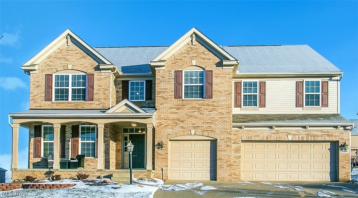 *Beautiful Brick Front Colonial In Upscale Springhill Community & Green LSD Offers 3,900 Square Feet Of Finished Living Space! *4 Bedrms, 2.5 Bathrms, FINISHED Basement, 3 CAR Garage, .31 Acres, Double Stamped Concrete Patios & Front Covered Porch ~ Near The End Of A Cul-De-Sac *Strategically Placed Windows For Natural Light W/Custom Upgraded Treatments Throughout! *Exquisite Columns & Molding *Stand Out Design W/Two Separate Stairways To The 2nd Floor! *Dramatic 2 STORY GREAT RM W/18' Ceiling, 8 Windows, Gas Fireplace W/Tile Surround, White Mantel And Dimensional Wall For Decor' *Living Rm Open To Formal Dining W/Glamour Crystal Chandelier *Fabulous Eat In Kitchen Featuring 50+ Modern Shaker Style Cabinets & Soft Close Drawers, GRANITE Countertops, ISLAND And Breakfast Bar *Stainless Steel & FULLY Applianced Including Gas Stove W/Double Oven! *Pantry, Desk W/Granite & 1st Flr Laundry *Enjoy Brunch Under A Stainless Steel Chandelier, Also OPEN To Great Rm ~ Seperated Only By Gorgeous P