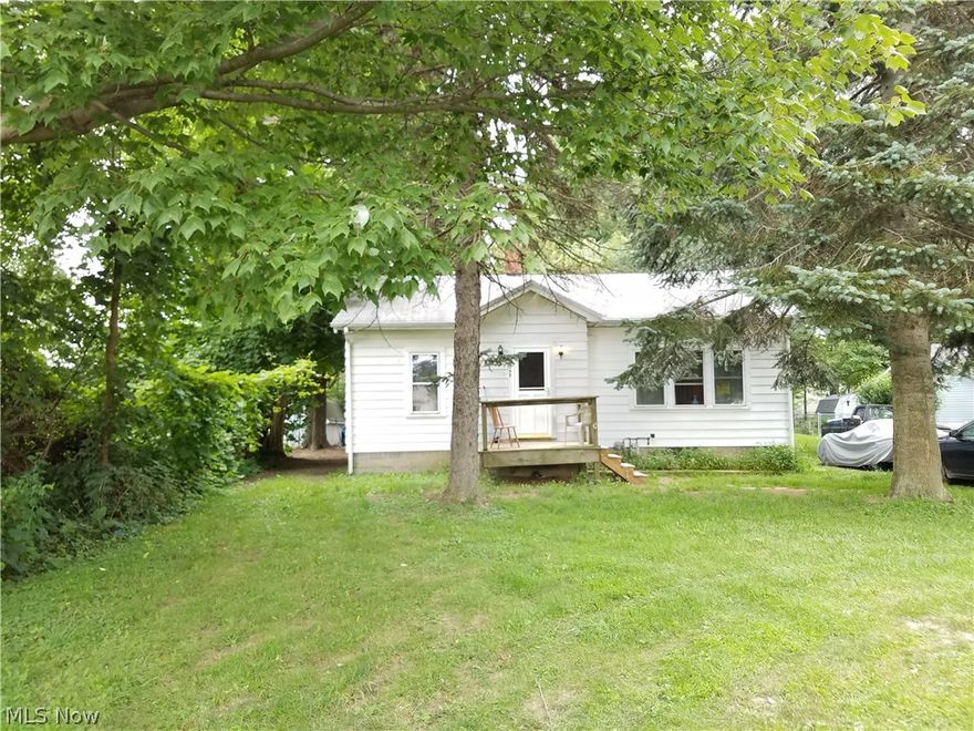 This is a cute 2 bedroom 1 bath bungalow home on almost one acre. Enjoy country living close to so much fun. Just moments away from Geneva on the lake and Lake Erie. Perfect for a starter home or a vacation home. With just a little TLC you can make it the way you like. Newer remodeled bath, almost all new windows, and newer counter tops in kitchen. Great price and owner wants sold quick, don't miss out!