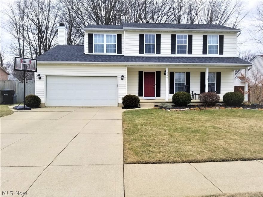 Fantastic four-bedroom, two bath, two story colonial centered in the southeast area of Elyria. This picturesque home in the Midview School District is a real treasure. A full width, inviting front porch greets you as you approach from a double wide driveway. Home has a secluded living room; and a free-flowing kitchen, dining, and family room area in the rear. The kitchen and dining areas are updated with an array of cabinets, wonderfully appointed set of counter tops with a breakfast bar, and a ceramic tiled floor. Sliding doors provide direct access to the large rear patio. The spacious family room has a lovely brick, wood burning fireplace on one end. The first floor is also wonderfully equipped with a full bathroom and a laundry room off of the kitchen. The second floor boasts four nice sized bedrooms and a dual access bathroom. The two-car garage, dry basement, and 150-amp main electrical service panel are definite pluses. The home is well placed on a big 143 deep x 70 wide lot wit