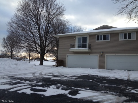Don't miss out on this fabulous condo for rent in Uniontown, right on the fairway at Ohio Prestwick Country Club and has access to the country club's amenities. Great one level layout, on the second floor, with indoor garage access with extra storage in the garage. Washer and dryer included, along with stove, refrigerator and dishwasher. Freshly painted and with hardwood floors through out the bedrooms, living and dining rooms. Views of the golf course from every window! This will go fast, act now to secure your showing! No pets, please.