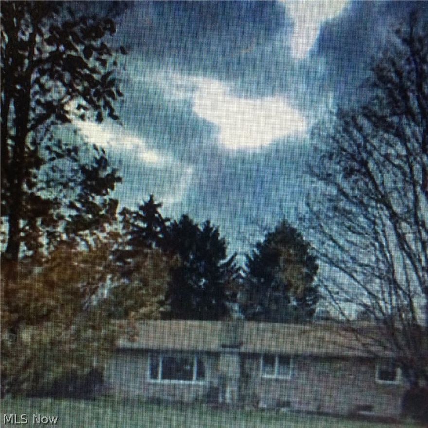 Charming home on 1 acre in Southeast schools.