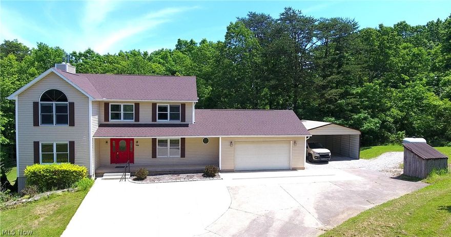 Spacious, updated, and private are just a few special features this gorgeous property holds. The home is situated on 2+ acres of land that surrounds the home. This stately home offers three spacious living areas, a formal dining room and a modern updated kitchen with granite countertops and solid hickory cabinetry as well as a mudroom and laundry area off the attached garage.  The upper level boasts a spacious master suite with a cathedral ceiling and a modern updated tiled walk-in glass shower unit, granite sink/vanity and a large walk-in closet. The upper-level hosts three more bedrooms and another full bath, but the amenities don't stop there.  The finished walk out basement houses another large living area, lots of extra storage closets, a fifth bedroom with walk in closet, and a tiled/modern bathroom.  The home was built with poured walls and offers a water softener, water filtration system, and a whole house vacuum.  The exterior features a covered deck, spacious patio, fire pit area, a newly poured driveway, and a newer roof.  To store your items, enjoy the attached garage, extra-large shed, and a carport. Don't let this one pass by, call to schedule your tour today!