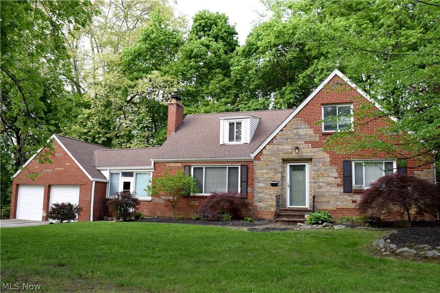 Meticulously maintained 4 BD 2 BA West Akron brick Cape on a spacious corner lot in the historic Sunset View subdivision! With 2 bedrooms and a full bath on each floor this home features an eat in galley kitchen w/gas range and access to the completely remodeled private sun room w/new tile ’15 as well as formal dining room w/hardwood floors leading into the formal foyer and large (23’x14’) living room w/wood burning fireplace. Well-appointed bedrooms and a fully updated bathroom with custom built-in cabinets and walk-in tile shower round off the 1st floor.  2nd floor hosts a massive master bedroom (27’x16’), full bath, and add’l office/bedroom. This home also boasts a waterproofed full basement that is perfect for storage with a partially finished rec room and fireplace, an enclosed breezeway off of living room leading to a 2 car attached garage, rear brick patio, and manicured landscaping. As an added bonus, washer and dryer stay! Updates include newer vinyl windows, hot water tank ('