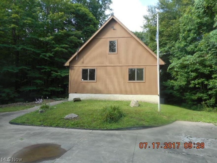 Unique bungalow style home on just over 2 acres features awesome wooded views from the deck! The detached garage will hold up to 8 cars and is ideal for hobbies, mechanics or outdoor equipment/toys/ATV etc. The great room features a vaulted ceiling and open concept living space. The master bedroom on the second floor is loft style, and offers a private full bath. Two bedrooms on the first floor, plus an additional bedroom or office, and rec space with second kitchen set up in the walk out basement. Lovely location, and with a few cosmetics, this home would be a real gem in the country.