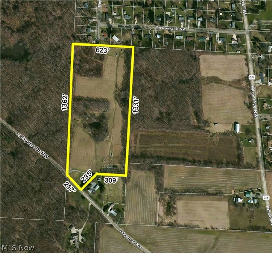 19.78 acres of open and wooded land with pole building. Lawrence Twp., Stark Co., Canal Fulton, Ohio.  This is a great property with nice rolling contour.  Ideal for building your hide-a-way home close to town.  Approx 11 acres is being farmed by tenant farmer.  32x40 pole building with electric, floor is plumbed with heated pipes (not hooked up).  Plan your showing today!  "Property sells subject to the estate".