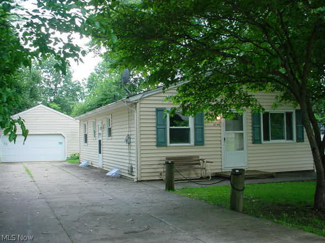 Great 2 bed ranch built 1973! Was a 3 bed and opened up to large master and added a screened porch off back of house/master bed! Whole house cooling fan & central air! Full basement ready to finish, concrete drive and 2+ detached garage. City water & sewer! 2015 painted from top to bottom! New carpet, counter bath enclosure and vinyl flooring. Ready to move in!