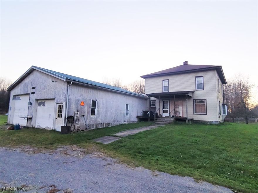 Spacious 4 Bedroom 2 Bath Home on 2 acres across from Ohio State Park area / Walk to Lake / Original stained glass windows above living room windows / TLC needed to make this a great home / Huge cement floor Garage with electric