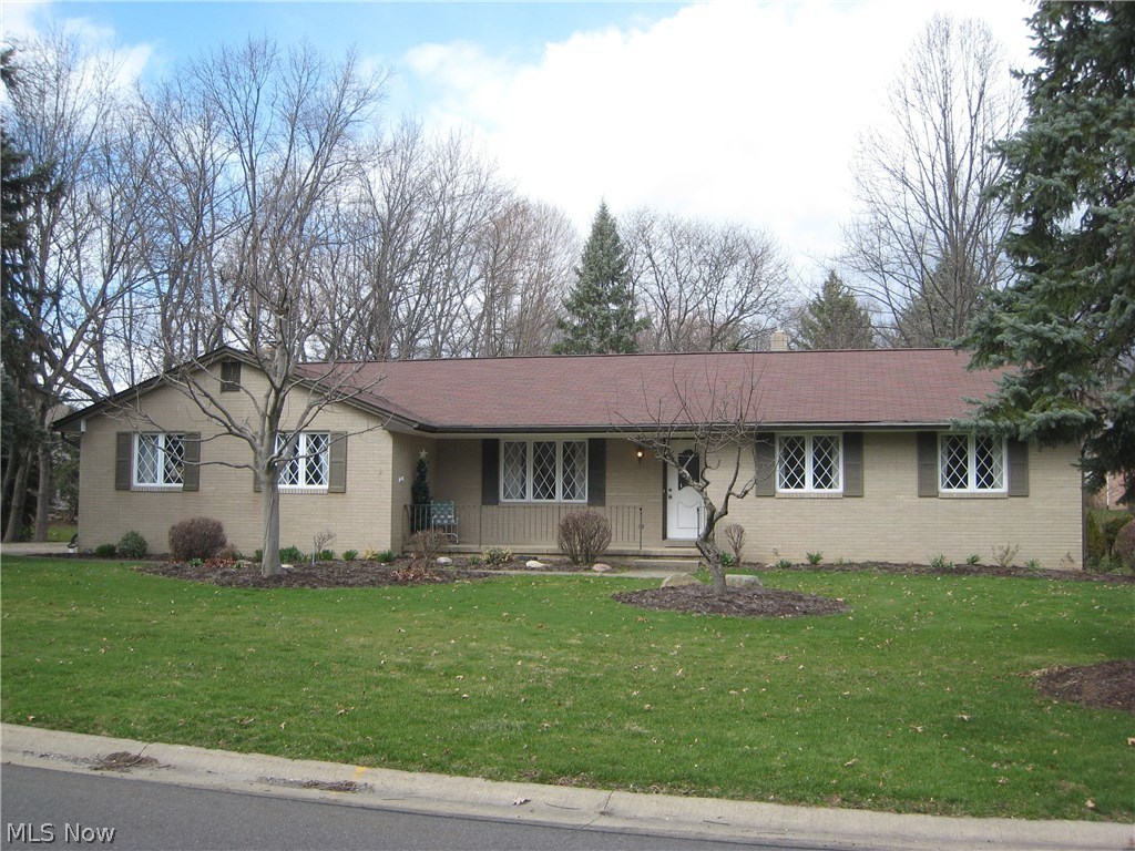 Bob-O-Link! Pristine and move in ready! True pride of home ownership is exemplified in this brick ranch nestled on a landscaped lot. The parquet foyer entry welcomes you to the freshly painted and newly carpeted interior. Updated kitchen includes all appliances and ceramic tile floor that extends into the spacious eating area. French doors lead out to the private patio, picnic area and cozy trellis with a swing. The garden is awaiting your flowers and herbs. Perennials are thoughtfully planted throughout the landscaped beds. Step down into the family room with woodburning fireplace (gas starter). The side load garage has pull down stairs for storage, new door w/opener that enters into a small foyer off of the family room. Full basement with glass block windows, electric panel with 200 amp service, sump pump, sealed and painted walls and painted floors. furnace 2013, central air 2006, hot water tank 2012, roof 2006. There is blown insulation, Pella windows and patio doors, and st