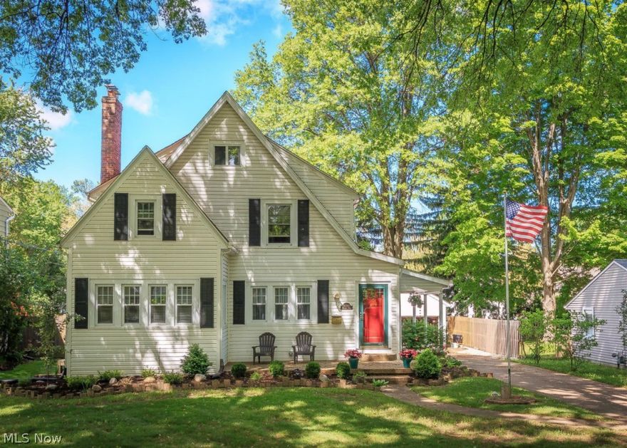 Bursting with charm and character!  Nestled on one of the most sought after tree lined streets in Mentor!  Living Room is spacious and features hard wood flooring and fireplace!  Sun Room off of the Living Room is perfect place to read or enjoy your morning coffee.  Entertain year round in the large Dining Room with hard wood flooring as well!  Kitchen offers plenty of cabinetry and an island!  Family Room features sliding glass doors to private back yard and patio space.  Master Bedroom features huge walk in closet!  Remodeled bathroom is spacious and features ceramic tile!  Enjoy outdoor living on your covered side porch with nature stone, patio space or roof top deck!  Fully privacy fenced in and offers newer roof, windows and hot water tank!  To see is to love!