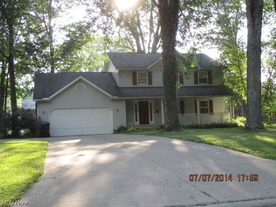 Very large home with possible additional basement bedroom and also office or work area.  Located just 2 blks from center of Wellington.  This could easily be your dream home.