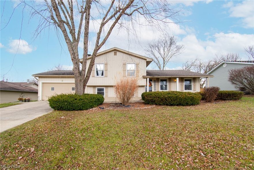 Welcome to 158 Carter Circle, a charming home featuring three bedrooms and two bathrooms sprawled across 1560 square feet. This residence offers a spacious layout ideal for comfortable living. Walking into the home you will be pleased to see a large family room leading into the dining and kitchen area. Entering the kitchen you will be stunned by the elegant shaker style cabinets as well as a brick inspired backsplash. Large sliding glass doors will take you outside on a brand new patio, viewing a lush backyard. Updates include: new flooring, carpet, and paint throughout, updated bathroom and new patio.