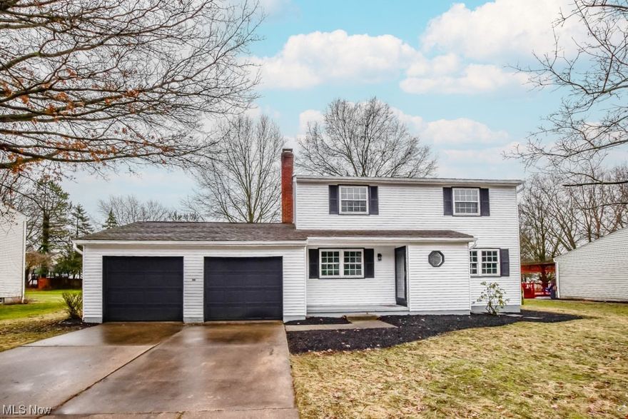 Step inside this beautifully remodeled two-story and you'll find a home tailored for family living! As you enter through the foyer, you'll find yourself between the inviting living room and cozy family room, complete with a gas fireplace for those chilly nights. The seamless flow leads you to the brand-new kitchen, boasting ample cabinet space, sleek quartz countertops, a stylish tile backsplash, stainless steel appliances, and a built-in pantry. Adjacent to the kitchen lies a space ideal for casual dining, with easy access to the freshly painted tiered deck overlooking the sizable backyard. For formal gatherings, the dining room awaits, ready to host holiday celebrations. Completing the first floor is a convenient half bath. Venture downstairs to discover the newly finished basement, ideal for movie and game nights, featuring plush new carpeting and an open joist ceiling. Upstairs offers four bedrooms, along with two full baths. The primary bedroom boasts a private bath with a tiled step-in shower, while the secondary bedrooms share a refreshed bath with an extended vanity and tub with shower surround. This impressive home is move in ready and perfectly located near schools, parks, and shopping. Call to see all that it has to offer today!