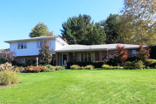 Outstanding one owner modified split, wonderfully maintained & updated with 3-4 bedrooms, 2.5 bath, 2202SF, with sunroom on private .58 acre lot* Looks like a split but more like a 2 story* Updated flooring throughout & updated bathrooms* Living room, dining & kitchen with wood like floor* Spacious applianced kitchen with maple cabinets, breakfast bar, desk, pantry, ceramic back splash, range, refrig, dishwasher & disposal* Dining area with slider to 14x24 3 season sunroom* 2 steps down from living room to walk out family room with brick wood burning fireplace, built in cabinet & book shelves* Next to family room is the recreation room or 4th bedroom with updated half bath & laundry (washer & dryer included)* Upper level with master bedroom, double closets & updated bathroom* 2 additional bedrooms & updated guest bath* Basement/work out area with new carpet* Furnace & central air 10/2006* Anderson windows* Humidifier* Water softener* Space guard air filter* Intercom* Attic fan* Salt bo