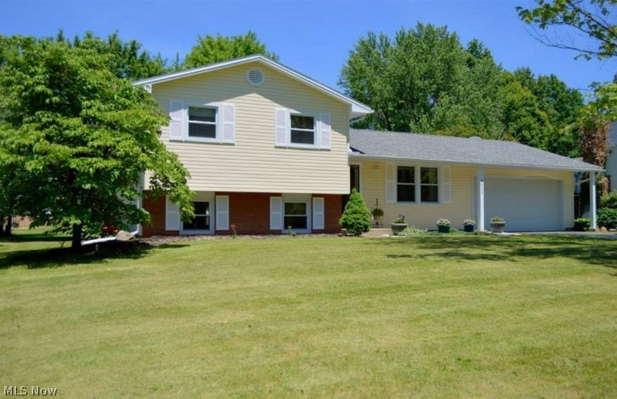 Spacious and extremely well maintained four level split. Three bedrooms, two full baths. Open kitchen with island and rec room / family room with french doors to a two tiered deck. Family room is open from the kitchen. Newer furnace and air conditioning 2012, roof 2009. Two car attached garage. Can see Glen Oaks school from the back yard. All appliances stay.  This move in condition home won't last long so make your appointment for a private showing today!