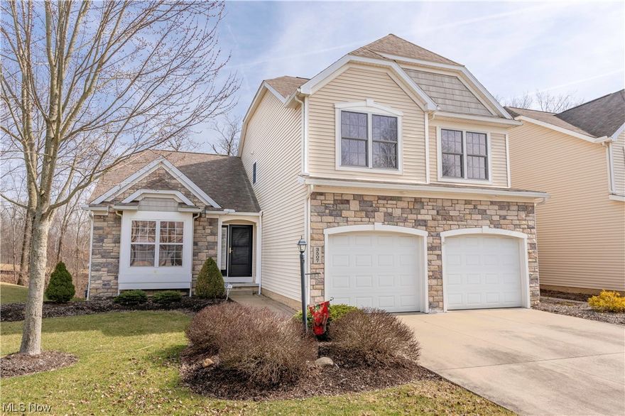 Fantastic well-maintained condo in the desirable North Pointe at Hunter's Crossing in Cuyahoga Falls! This beautiful three-bedroom, two-and-a-half bath, with a loft, offers over 3,400 Sq Ft of living space. A cozy foyer welcomes you in and offers access to the attached 2-car garage. To the left is a charming dinette area with large windows and the eat-in kitchen with cabinets galore, stainless steel fridge and sink, and ample counter space. The spacious great room features a gas fireplace with a beautiful mantel, vaulted ceilings, an abundance of natural light, and sliding glass doors to the second-story deck. Located off the great room is a dining room with a view of the backyard great for family get-togethers. The first-floor master suite offers vaulted ceilings, 2 large closets, and a private master bath with a double vanity, an oversized mirror, a jetted tub, and a standing shower. The first floor is completed by the laundry room with a utility sink and storage, and a convenient half bath. Upstairs is a spacious loft area that overlooks the great room, two generous bedrooms, a full bath with a large vanity, and a large storage closet. Complete with a partially finished basement with ample storage space and a walkout to the patio. Don't miss this one! Make an appointment for your private showing today.