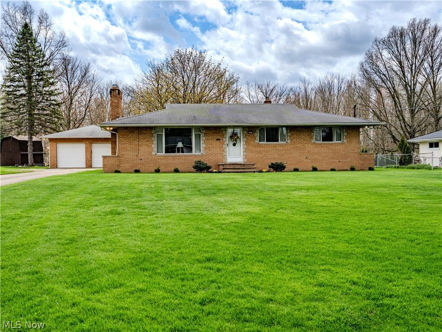 Welcome to this all-brick ranch set on a spacious, almost half-acre lot in highly desirable North Royalton, offering the perfect blend of quality construction, functional space, and standout features throughout. With 3 bedrooms, 2 full baths, and over 2,700 sq ft of finished living space, this home delivers far more than meets the eye.
Step inside to a bright, inviting layout where natural light fills the main living areas, highlighted by a beautiful wood-burning fireplace that anchors the space. Hardwood flooring, built-ins, and thoughtful storage solutions add both character and everyday practicality. The eat-in kitchen features ample cabinetry and workspace, with views overlooking the expansive backyard.
The updated primary bathroom is a true upgrade, featuring heated flooring for added comfort and a touch of luxury. Downstairs, the finished basement expands your living and entertaining space with a second wood-burning fireplace and a vintage-style bar with built-in cabinetry, creating a unique and memorable setting for gatherings.
This home is built for those who value space and functionality. The oversized detached garage is a rare find, complete with its own separate basement and attic, offering exceptional storage, workshop potential, and even an included air compressor setup ideal for hobbyists or trades.
Additional highlights include hot water heating, cedar closets, quality plumbing fixtures, newer Andersen windows, and an abundance of storage throughout both the home and garage.
Outside, enjoy a large, private yard with endless possibilities for entertaining, recreation, or future expansion, all within a top-rated school district. For added peace of mind, the seller is including a home warranty, making this an even more attractive and secure opportunity.
Solid, spacious, and packed with character, this is a home that delivers immediate comfort with long-term upside. Welcome Home!