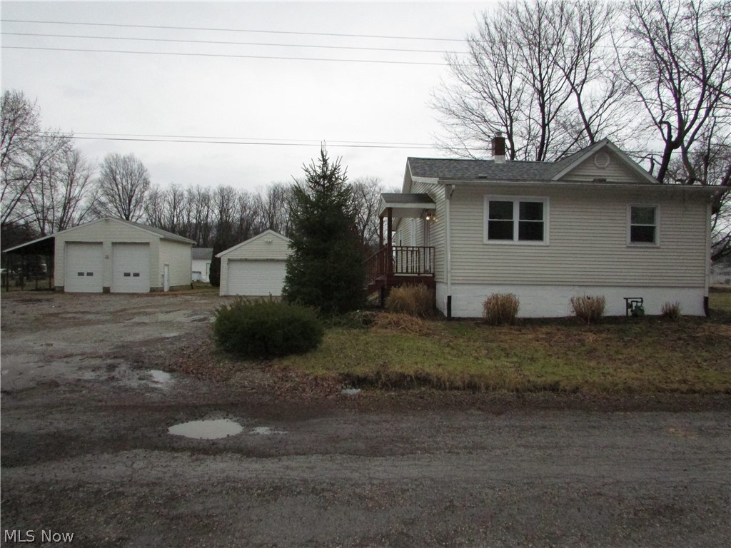 Garage space at its best at this 3 bedroom ranch in Norton on .72 acres. The "big" garage is 24x24, with 14' doors and is heated with electric. There is also a 2 car garage, and a shed. The home has been updated with a new bath, redone hardwood floors, fresh paint, new carpet, and an updated kitchen. There is an enclosed back porch, deck, first floor laundry, and so much more.