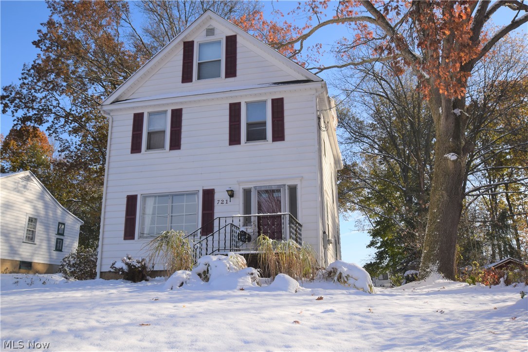 Welcome to 721 Vine Street in Kent! This lovely home with numerous updates throughout is located on a quiet street in Kent. Step inside the front door to see the beautiful hardwood floors in the living and dining rooms. Half bath and mudroom located off the kitchen along with a back door. Second level has three spacious bedrooms and a full bathroom with an attached laundry room. Third floor has a fourth bedroom, full bathroom and large closet area. Two-car garage has attic space with tons of storage space. Covered porch located on the side of the garage. New washer and dryer (2019), bedroom carpet, laundry room, half bath, and third floor remodeled in 2014. This home is conveniently located just 0.5 miles from Kent State University’s campus. This home is also located close to Downtown Kent. Don’t let this one pass you by!