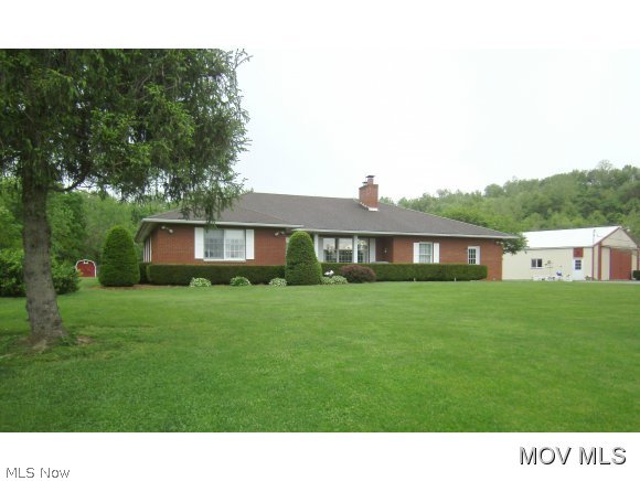 All brick one owner home that shows pride of ownership. Situated on over 3 acres of level land, with a view of the Harra Covered Bridge. Open floor plan with generous kitchen, 3 spacious bedrooms, 2 full bathrooms, a peaceful sunroom, laundry/mud room and ample closet space, and 2 car attached garage complete the first floor. Finished basement offers a second kitchen, 4th bedroom, 24x15 storage room and a half bath. Outside features include 12x15 covered patio, 10x12 storage building, fenced kennel area, garden area and an impressive 60x42 Morton Building. This house has so much to offer. Elem: Waterford Elementary School Elem/Bus: Y JrHigh: Waterford Jr. High JrHigh/Bus: Y High: Waterford High School High/Bus: Y Fire: VOL Police: SHF ;SQFT=Fin L1:2235, Fin Bsmt:1875, Fin Above:2235, Fin Total:4110, Unfin Bsmt:360, Unfin Above:360;GAR= 2 Car Att, Gar Other-See Remarks;PRKG= RV Parking