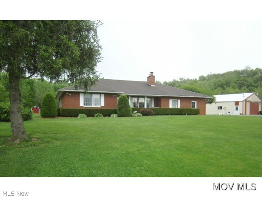 All brick one owner home that shows pride of ownership. Situated on over 3 acres of level land, with a view of the Harra Covered Bridge. Open floor plan with generous kitchen, 3 spacious bedrooms, 2 full bathrooms, a peaceful sunroom, laundry/mud room and ample closet space, and 2 car attached garage complete the first floor. Finished basement offers a second kitchen, 4th bedroom, 24x15 storage room and a half bath. Outside features include 12x15 covered patio, 10x12 storage building, fenced kennel area, garden area and an impressive 60x42 Morton Building. This house has so much to offer.  Elem: Waterford Elementary School  Elem/Bus: Y  JrHigh: Waterford Jr. High  JrHigh/Bus: Y  High: Waterford High School  High/Bus: Y  Fire: VOL  Police: SHF  ;SQFT=Fin L1:2235, Fin Bsmt:1875, Fin Above:2235, Fin Total:4110, Unfin Bsmt:360, Unfin Above:360;GAR= 2 Car Att, Gar Other-See Remarks;PRKG= RV Parking