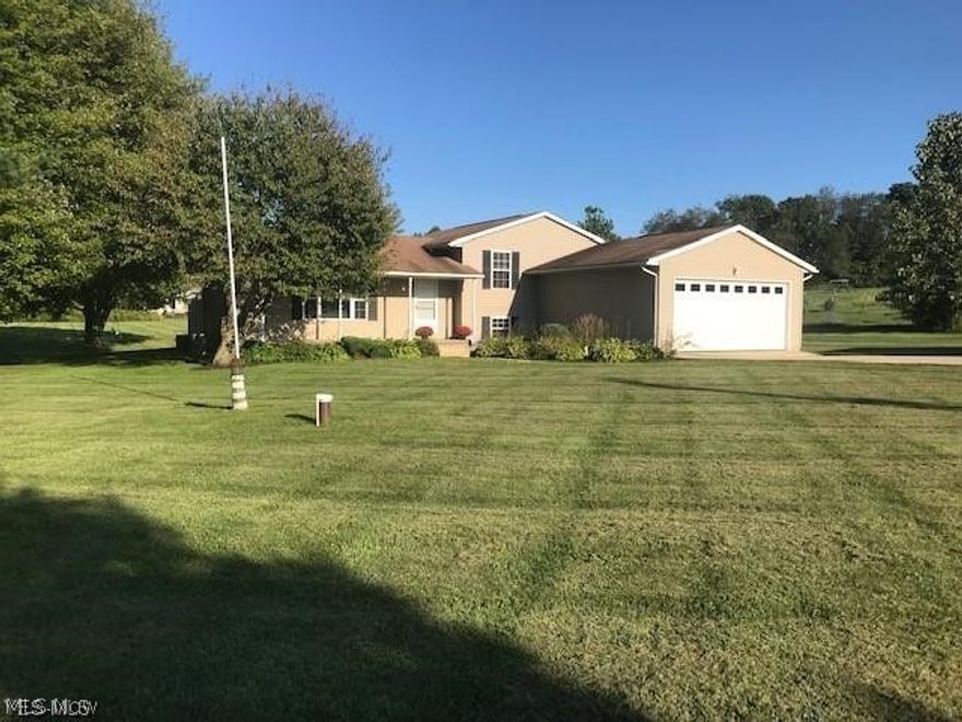 Welcome Home To This 1.6 Acre Super Large Multi-Split Level In Beautiful Mantua! Even Though Built In 2000, This House Has Been Completely Remodeled Recently! Almost 60k Spent In The Kitchen Alone! From Cabinets, Luxury Countertops, Sink, Moen Fixtures, Accent Lighting, And LVT Flooring On Entire First Floor All Complete In 2017! Stainless Steel Appliances Installed In 2016! Reverse Osmosis, H2O Tank And AIO Softener System Installed In 2016! High Efficient Furnace And A/C Just Updated In 2018! New Garage Door 2016! Custom Built Handrails! Anderson Windows Throughout! All Fixtures Are LED And Ceilings Fans Recently Replaced Too! All Rooms Freshly Painted Including The Basement Floor! Deck Was Stained In 2018! 3 Bedrooms Up As Well As 2 Full Baths Including Master! Giant Great Room And Office Or Fourth Bedroom On The First Lower Level Also With A Full Bath! Basement Has 2 Sides, One Semi-Finished And The Other Side Is The Laundry/ Utility Area. Large Oversized 2 Car Attached Garage AND