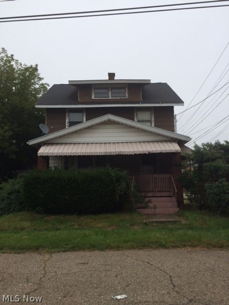 Two story home with loads of potential. Has an attached store front. Zoning has lapsed back to residential so the property cannot be used for retail/ business purposes at this point. Call zoning department for first hand information if that is the buyer's intention. Buyer to do due diligence. The store front area could be used as a family room for a single family residence. Priced right to make/turn this home into whatever your heart desires! Sold as-is.