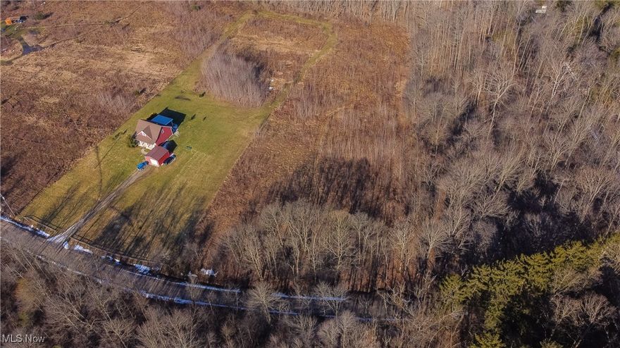 Discover this beautiful 2.3 acre lot in Ashtabula County, just a stone's throw from the scenic Grand River. Perfect for those seeking a peaceful retreat, this property offers ample space to build your dream home or create a weekend getaway. Enjoy proximity to outdoor activities, including fishing, hunting, hiking, camping, golfing, and boating. While still just a short drive from local amenities, including Geneva on the Lake, Spire Sports Academy, Ashtabula County Fairgrounds, Historical Mechanicsville Road Covered Bridge, Grand River Manor, and Countless Wineries! With its natural beauty and prime location, this lot is an excellent opportunity to invest in a tranquil environment. Don't miss out on this rare find in a sought-after area!