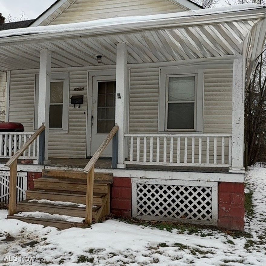 Two single-family homes on one lot. One 2-BR ranch and one 4-BR bungalow. Newer windows, roofs, furnaces, hot water tanks, storm doors, exterior siding, and updated wiring. Living room, dining room, and kitchen in each home. Natural woodwork in bungalow dining room with window seat. Two additional lots (50x95 each), one with a 4-car garage. Current rents below market. Great investment