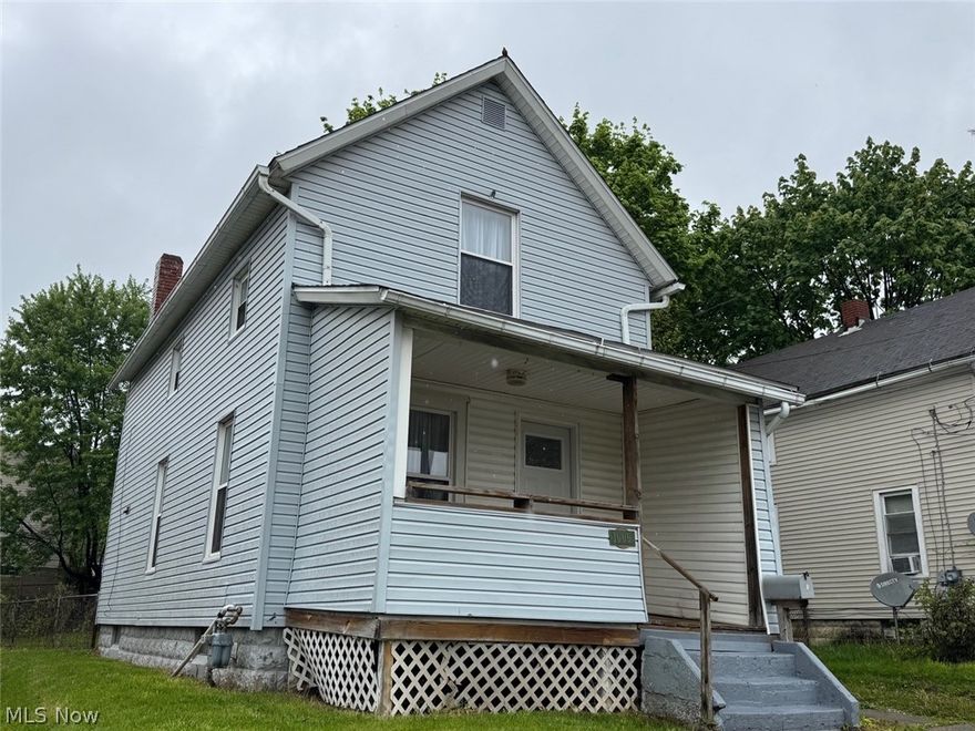 Great starter or investment. Ready to move into and enjoy the good life in Kenmore! No maintenance exterior with vinyl siding and replacement windows. Roof approx 4-5 years old. New flooring and paint throughout. Kitchen has updated base cabinets and counter tops and older upper cabinets. Handy half bath off kitchen convenient to the back door. The full bath has newer tub, vanity, and toilet. The larger bedroom has two closets and one that is walk-in. The basement was waterproofed many years ago and has a sump pump. The furnace and hot water tank are older but functioning. The plumbing is plastic. The electrical box has been updated. There are two driveways, one on each side of the house. This is very convenient when having company.