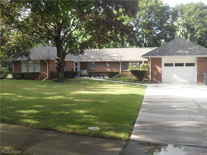 Incredible brick ranch w/over 1700 sq ft! Updated utility room w/attached bathroom & 5X4 curbless, tiled shower. Two large bedrooms w/tons of storage. New concrete driveway and patio. Newer roof. Huge family room w/attached dining room-great for entertaining. Ready for your finishing touches!