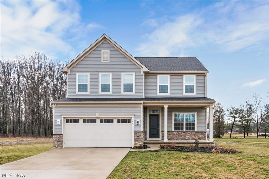 Located in the Estates of Sheffield neighborhood, dreams become reality in this vision board worthy Sheffield Village colonial. The exterior on this 2021 build is completely up to date on design and offers ample curb appeal. Enter through the covered front door and be greeted by a neutral interior, luxury laminate flooring, and a wonderful open floor plan. The sun-drenched main living area is ideal for entertaining with seamless flow between living room, kitchen, and breakfast nook. The catalog white eat-in kitchen comes fully equipped with brand newer stainless steel appliances, ample cabinetry, and wide center island with plenty of room for seating. Convenient half bath completes the first floor. All 4 bedrooms including the large master suite are placed on the second floor. This master suite was well thought out with plush neutral carpeting, a massive walk-in closet with shelving, and attached master bath with dual sinks, private toilet, and walk-in shower. The 3 secondary bedrooms