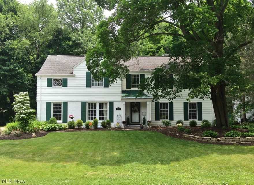 Impeccable 2 story Colonial on a desirable lot.  Custom cherry kitchen and large pantry in mud room.  Master suite with 2 closets - one with built in vanity.  Huge hallway storage area.  Family room with skylights, bay windows leads to brick patio area.  Play area for children plus storage shed.