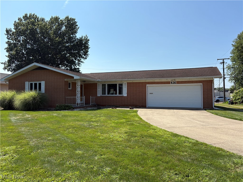 Original owner, first time offered! 3 bedroom, 2.5 bath all brick ranch in Reeves Heights. Spacious living room. Kitchen appliances included. Sliding glass doors in the dining room lead to the enclosed patio. Master bedroom includes private half bath. Main floor laundry hook-ups with additional hook-ups in the lower level. Massive rec room in the lower level includes the pool table. 2 car attached garage. Updated include new water heater in 2020, new air conditioner in July 2024. Quality built by Ray Shotwell. Convenient location, close to schools, shopping, and the Y!