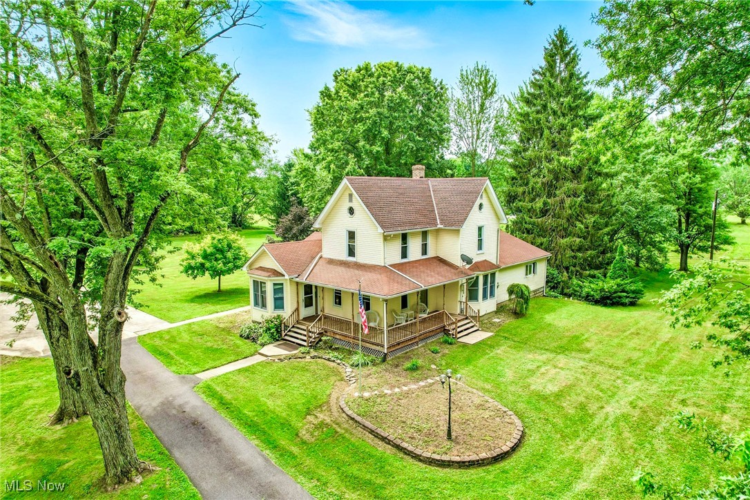 Beautiful Farm House sitting on 3.92 Acres with 319 ft. frontage. Wrap around porch. 40x26 garage/outbuilding 4-6 car capacity with floored 2nd floor. 3 bdrms. 2 full baths. Living Rm with Bayed window, Dining area open to Living Rm. Large Country Kitchen w/bayed eating area, ceramic heated floors, breakfast bar, display cabinet, half moon window above sink area. Sink has hot water tap. Tons of storage. Family Rm. 1st floor bedroom w/walk in closet, bath and large laundry Rm w/extra storage complete 1st floor. 2 nice size bedrooms & full bath on 2nd floor. Drive is blacktop with large cement parking in front of 40x26 Outbuilding. Outbuilding has electric, 2 door openers. Water is ran to outbuilding but not hooked up. Shed. House has 200 amp service with newer wiring. All electric Home. Basement plumbing was redone around 2020. Roof on garage 7/25. Bazetta TWP. Lakeview schools. Century Home built in 1891.
